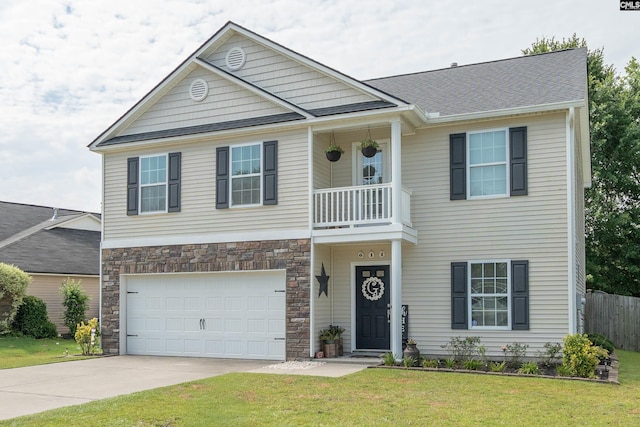 611 Colony Lakes Dr, Lexington, SC 29073 - view of front of property with a balcony, concrete driveway, an attached garage, and stone siding