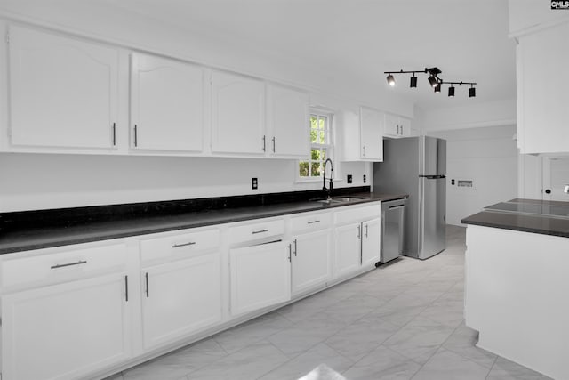 455 Harleston Rd, Irmo, SC 29063 - kitchen featuring stainless steel appliances, white cabinets, and dark countertops