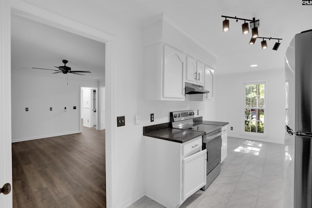 455 Harleston Rd, Irmo, SC 29063 - kitchen featuring electric range, freestanding refrigerator, dark countertops, a ceiling fan, and white cabinets