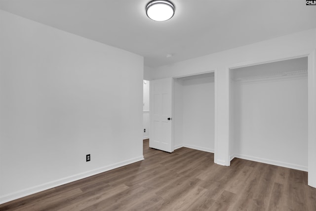 455 Harleston Rd, Irmo, SC 29063 - unfurnished bedroom with wood finished floors and baseboards