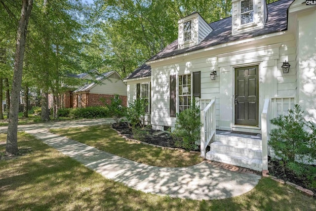455 Harleston Rd, Irmo, SC 29063 - doorway to property featuring a lawn and roof with shingles