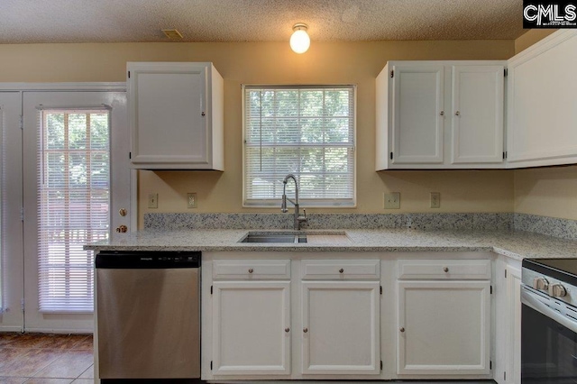 125 Durham Creek Ct, Columbia, SC 29229 - kitchen with stainless steel appliances, white cabinetry, tile patterned floors, and light stone counters