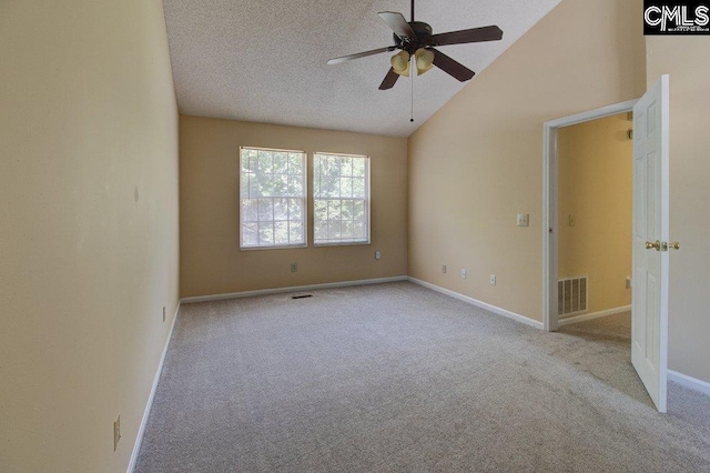 125 Durham Creek Ct, Columbia, SC 29229 - spare room featuring vaulted ceiling, carpet floors, ceiling fan, and a textured ceiling