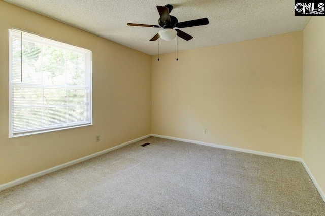 125 Durham Creek Ct, Columbia, SC 29229 - carpeted empty room featuring a ceiling fan and a textured ceiling