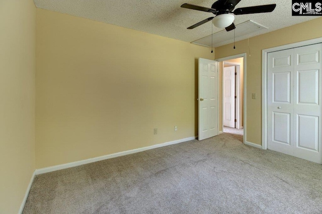 125 Durham Creek Ct, Columbia, SC 29229 - unfurnished bedroom featuring attic access, carpet floors, a textured ceiling, a ceiling fan, and a closet
