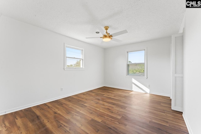 9829 Highgate Rd, Columbia, SC 29223 - empty room with a textured ceiling, a ceiling fan, and wood finished floors