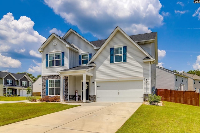 2 Hay Field Ct, Lugoff, SC 29078 - view of front of property with stone siding, driveway, a garage, and a residential view