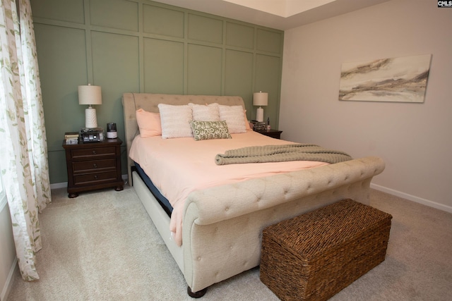 140 Green Ivy Ct, Camden, SC 29020 - bedroom with light carpet and a decorative wall