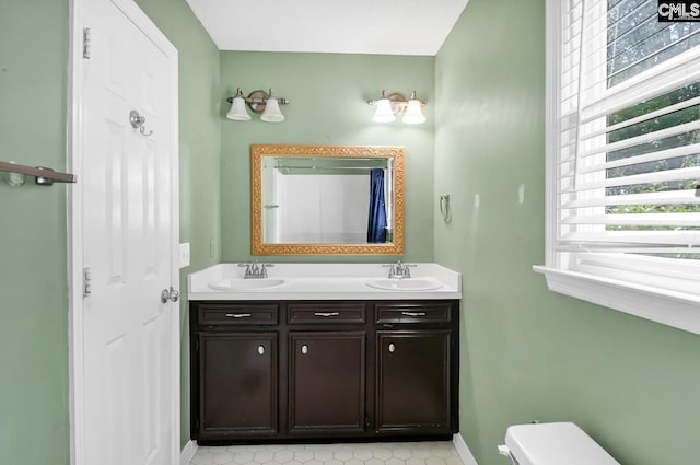 263 Sausage Ln, West Columbia, SC 29170 - full bathroom with plenty of natural light and double vanity
