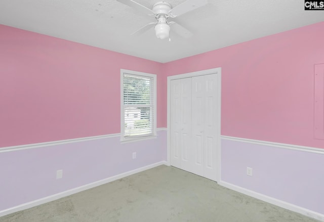 263 Sausage Ln, West Columbia, SC 29170 - unfurnished bedroom with carpet, a closet, and ceiling fan