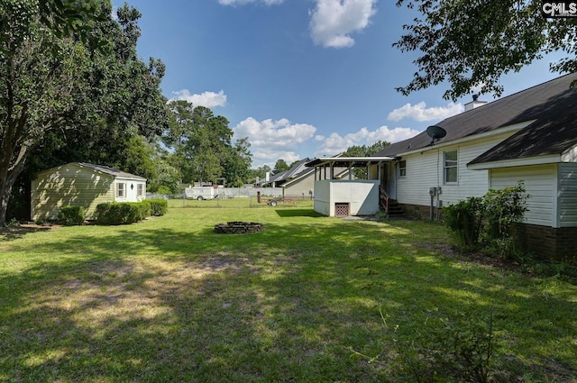 263 Sausage Ln, West Columbia, SC 29170 - view of yard featuring a fire pit