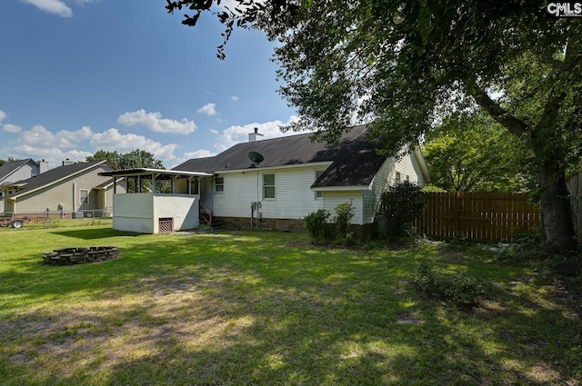 263 Sausage Ln, West Columbia, SC 29170 - back of property featuring a sunroom and a chimney