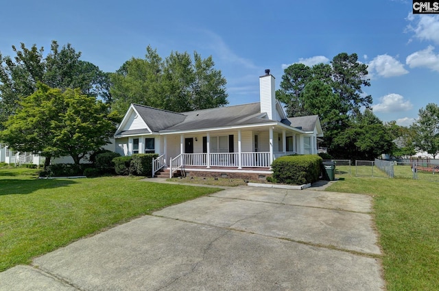 263 Sausage Ln, West Columbia, SC 29170 - view of front facade with crawl space, a porch, a chimney, and roof with shingles