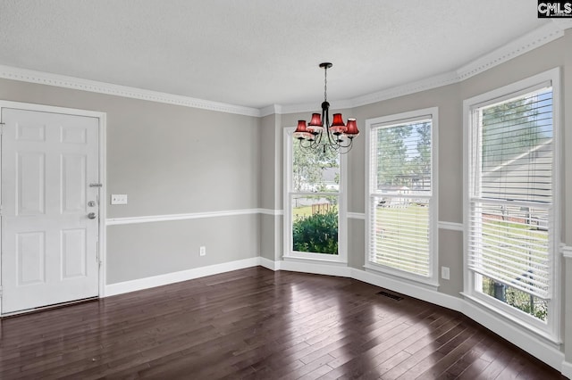 263 Sausage Ln, West Columbia, SC 29170 - unfurnished dining area featuring a chandelier, dark wood-style floors, a textured ceiling, and crown molding
