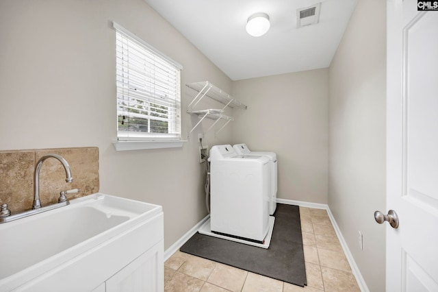 267 Caedmons Creek Dr, Irmo, SC 29063 - laundry room featuring washing machine and dryer and light tile patterned floors