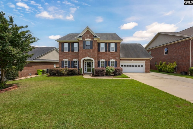 267 Caedmons Creek Dr, Irmo, SC 29063 - georgian-style home with brick siding, a garage, driveway, a front lawn, and roof with shingles