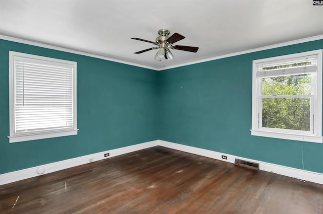4614 Briarfield Rd, Columbia, SC 29206 - empty room with ceiling fan, dark wood finished floors, and crown molding