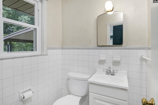 4614 Briarfield Rd, Columbia, SC 29206 - bathroom with vanity, tile walls, and wainscoting