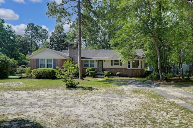 4614 Briarfield Rd, Columbia, SC 29206 - single story home with brick siding, a chimney, and a front yard
