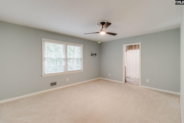 2214 Elkridge Dr, Camden, SC 29020 - empty room with a ceiling fan and light carpet