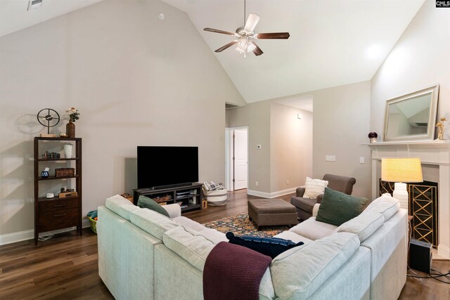 2203 Newberry Landing Cir, Newberry, SC 29108 - living area with high vaulted ceiling, a ceiling fan, dark wood finished floors, and a tiled fireplace