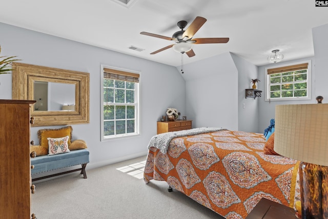259 Sessions Rd, Elgin, SC 29045 - bedroom featuring multiple windows, carpet floors, a ceiling fan, and vaulted ceiling