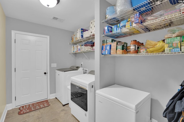 1140 Counts Ferry Rd, Lexington, SC 29072 - laundry area featuring separate washer and dryer and baseboards