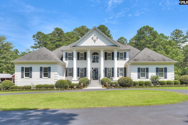 3450 Summerland Hwy, Leesville, SC 29070 - greek revival house with a front lawn and a shingled roof
