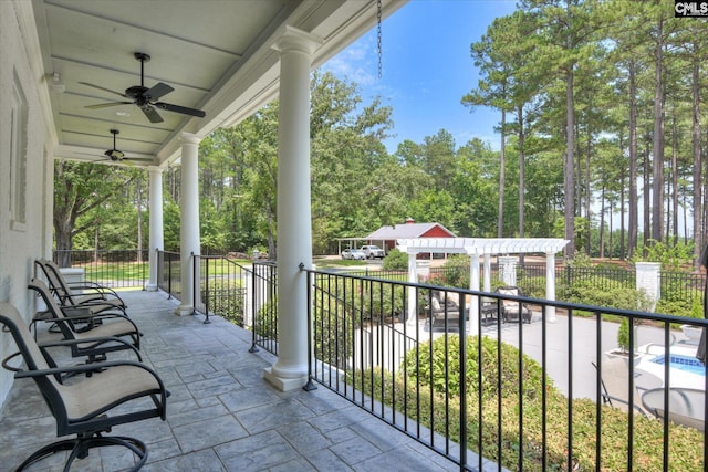 3450 Summerland Hwy, Leesville, SC 29070 - covered porch with ceiling fan, a pergola, and view of wooded area