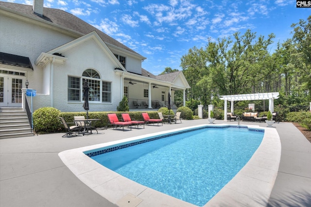 3450 Summerland Hwy, Leesville, SC 29070 - swimming pool with a pergola, ceiling fan, a patio area, and french doors
