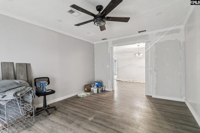 2032 Pinewood St, Cayce, SC 29033 - interior space with wood finished floors, crown molding, a textured ceiling, and ceiling fan