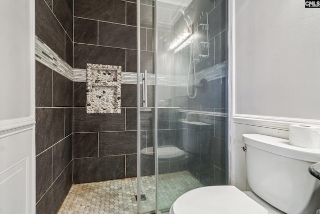 2032 Pinewood St, Cayce, SC 29033 - bathroom with a shower stall and a wainscoted wall