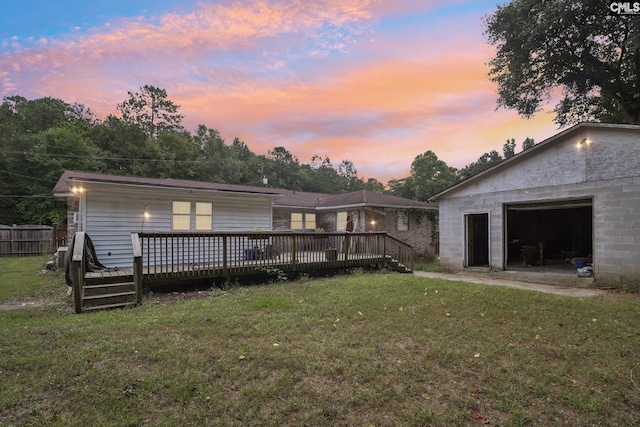 2032 Pinewood St, Cayce, SC 29033 - back of house at dusk featuring a wooden deck