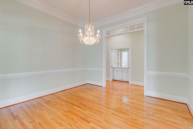 201 Arcadia Lakes Dr, Columbia, SC 29206 - spare room with a chandelier, wood finished floors, and ornamental molding