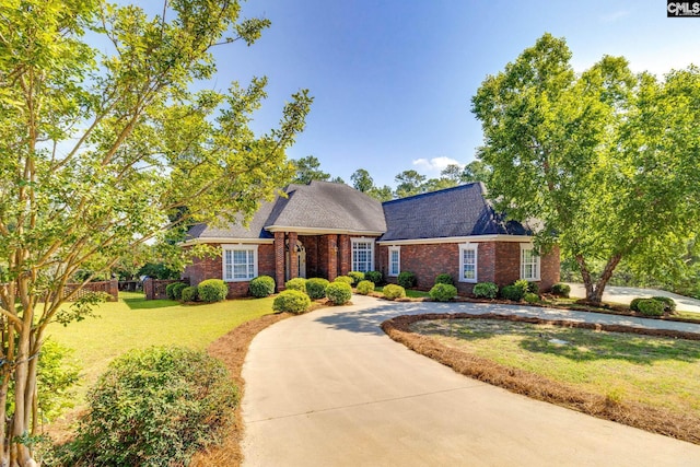 201 Arcadia Lakes Dr, Columbia, SC 29206 - view of front of home featuring brick siding and curved driveway