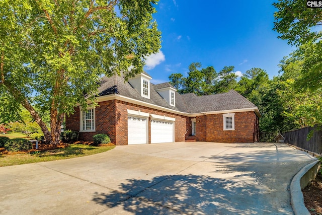 201 Arcadia Lakes Dr, Columbia, SC 29206 - view of front of property featuring brick siding, a garage, and concrete driveway