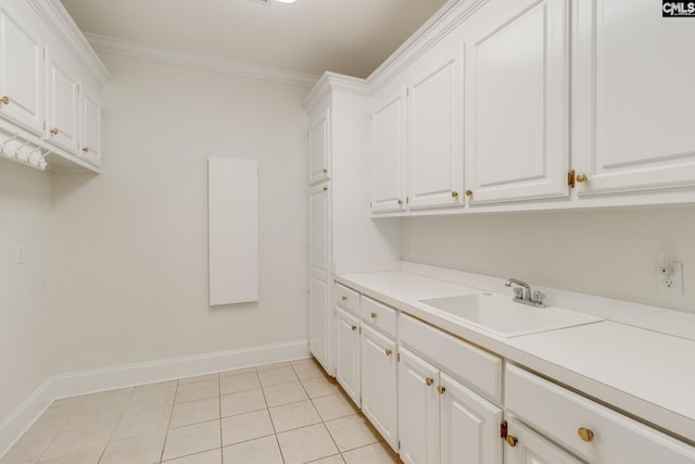 201 Arcadia Lakes Dr, Columbia, SC 29206 - laundry area featuring ornamental molding and light tile patterned flooring
