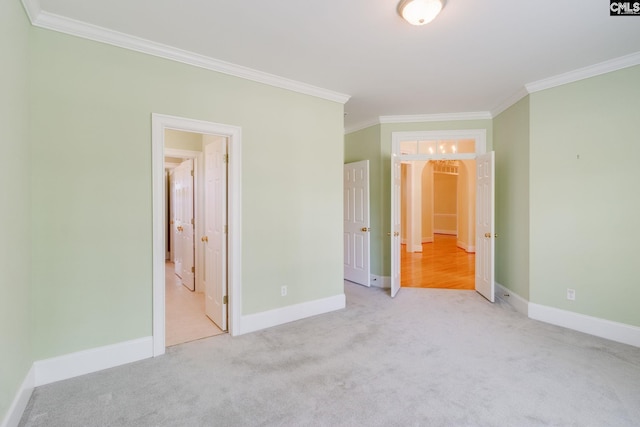 201 Arcadia Lakes Dr, Columbia, SC 29206 - unfurnished bedroom featuring ornamental molding, carpet floors, and arched walkways