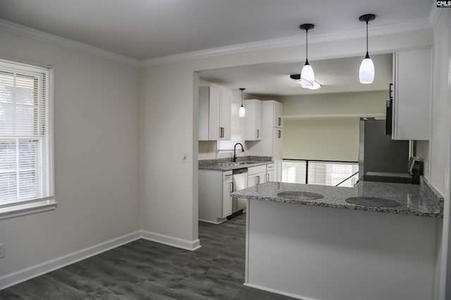 960 Curtis St, Columbia, SC 29210 - kitchen with stainless steel appliances, plenty of natural light, dark wood-style flooring, white cabinets, and ornamental molding