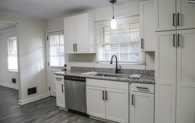 960 Curtis St, Columbia, SC 29210 - kitchen with dishwasher, ornamental molding, white cabinetry, light stone countertops, and dark wood-type flooring