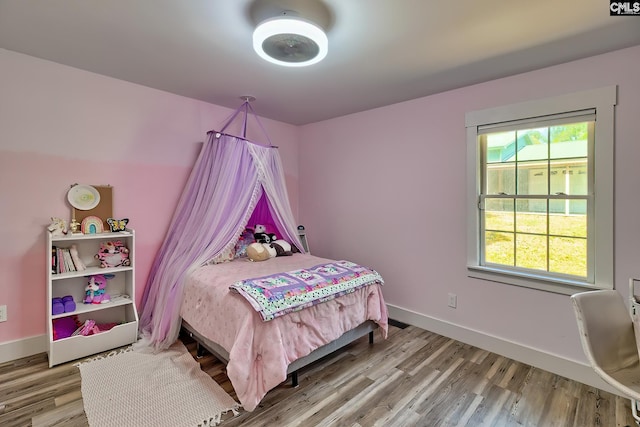 5404 Fairview Rd, Batesburg, SC 29006 - bedroom featuring wood finished floors and baseboards