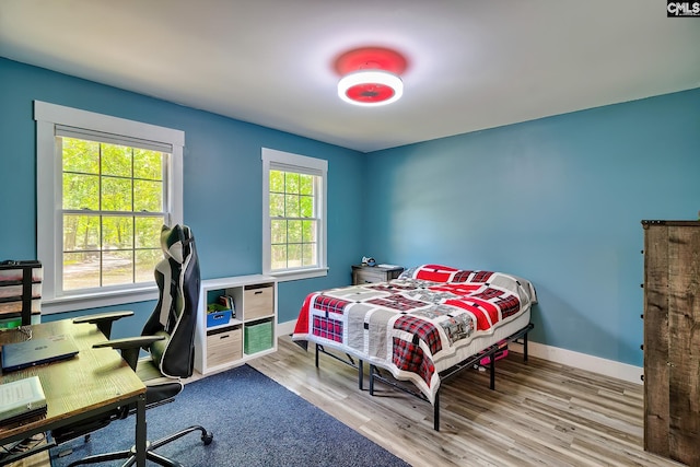 5404 Fairview Rd, Batesburg, SC 29006 - bedroom with wood finished floors and an office area