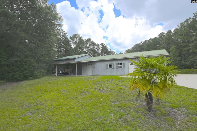 5404 Fairview Rd, Batesburg, SC 29006 - back of house with a yard and a metal roof