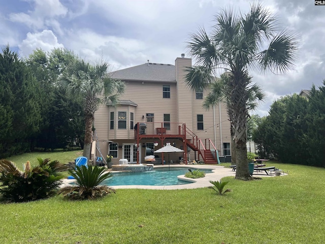 127 Brooklet Dr, Lexington, SC 29072 - back of house featuring stairway, a lawn, and an outdoor pool