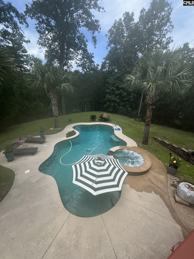 127 Brooklet Dr, Lexington, SC 29072 - view of swimming pool featuring a patio, a lawn, and a pool with connected hot tub
