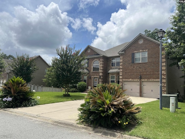 127 Brooklet Dr, Lexington, SC 29072 - view of front of house with driveway, an attached garage, and brick siding