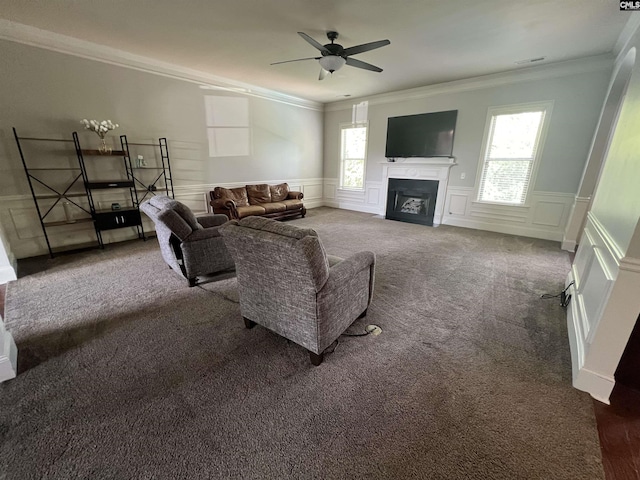 127 Brooklet Dr, Lexington, SC 29072 - living area featuring ornamental molding, dark colored carpet, a ceiling fan, a decorative wall, and a fireplace