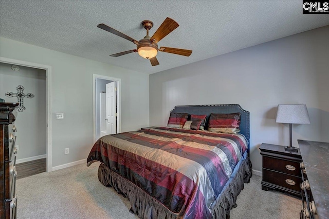 27 Lacebark Ln, Elgin, SC 29045 - bedroom with carpet flooring, ceiling fan, and a textured ceiling