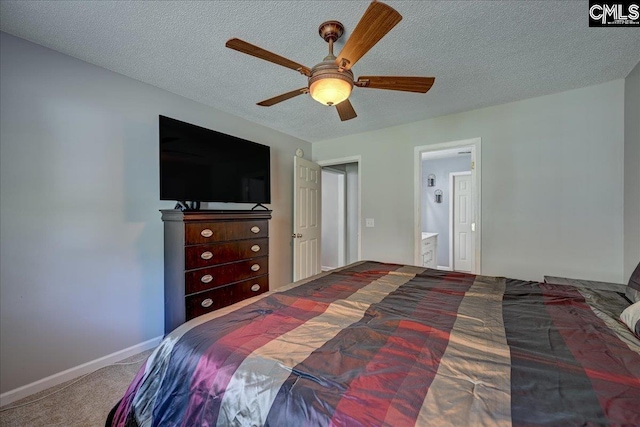 27 Lacebark Ln, Elgin, SC 29045 - carpeted bedroom with a textured ceiling, ceiling fan, and ensuite bathroom