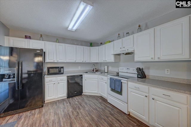 27 Lacebark Ln, Elgin, SC 29045 - kitchen featuring black appliances, under cabinet range hood, a textured ceiling, dark wood-style flooring, and white cabinets